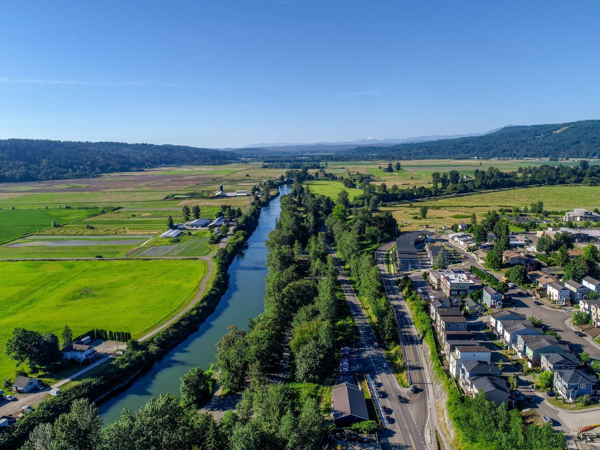 Aerial view of Duvall neighborhoods beside Snoqualmie Valley farmland, where Mayster provides HVAC services in Duvall WA for local homes