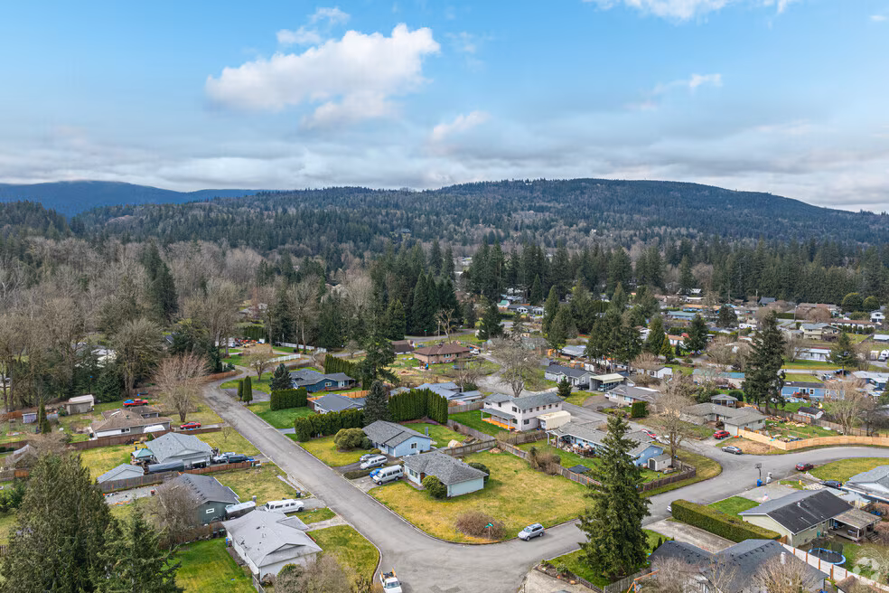 Aerial view of Fall City homes and fields beneath the foothills, where Mayster delivers HVAC services in Fall City WA to nearby families