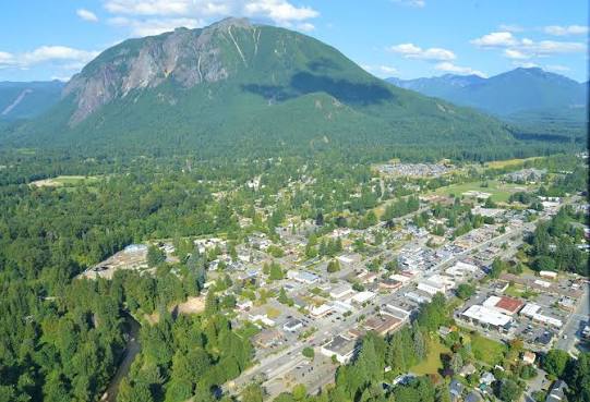 Mount Si rising above the town of North Bend, a community where Mayster offers HVAC services in North Bend WA to homeowners