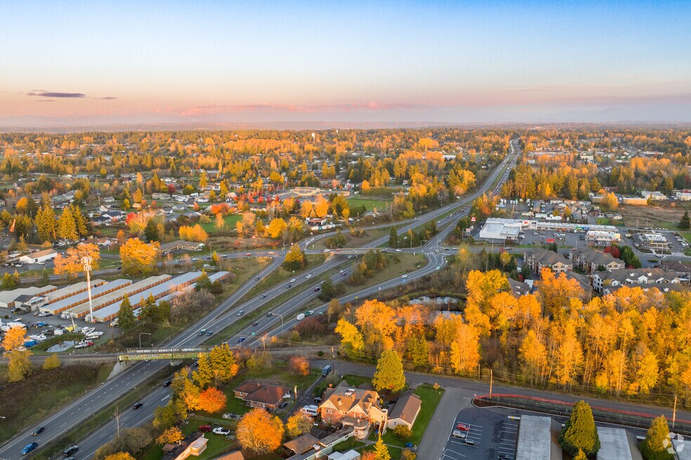 Aerial view of Summit View streets with autumn trees at sunset, a community where Mayster offers HVAC services in Summit View WA to homeowners