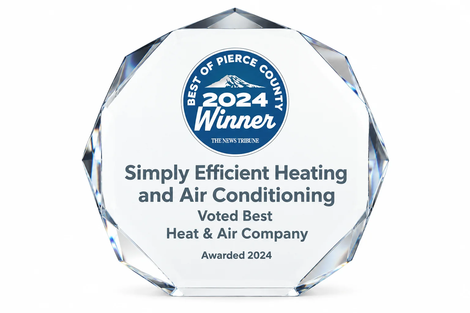 A circular, faceted glass award celebrating Simply Efficient Heating and Air Conditioning as the 2024 Best Heat & Air Company.