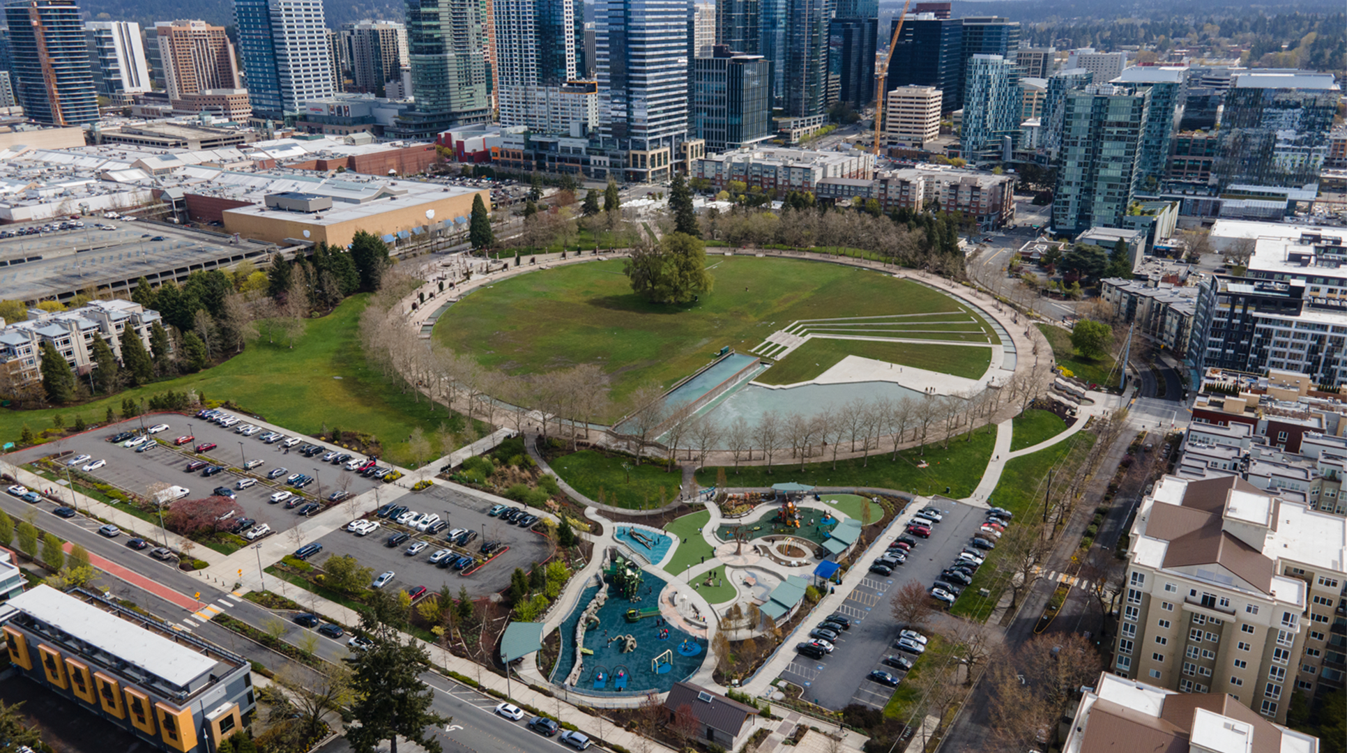 Aerial view of Downtown Park surrounded by high-rise towers and apartments, where Mayster delivers HVAC services in Bellevue WA to local homeowners